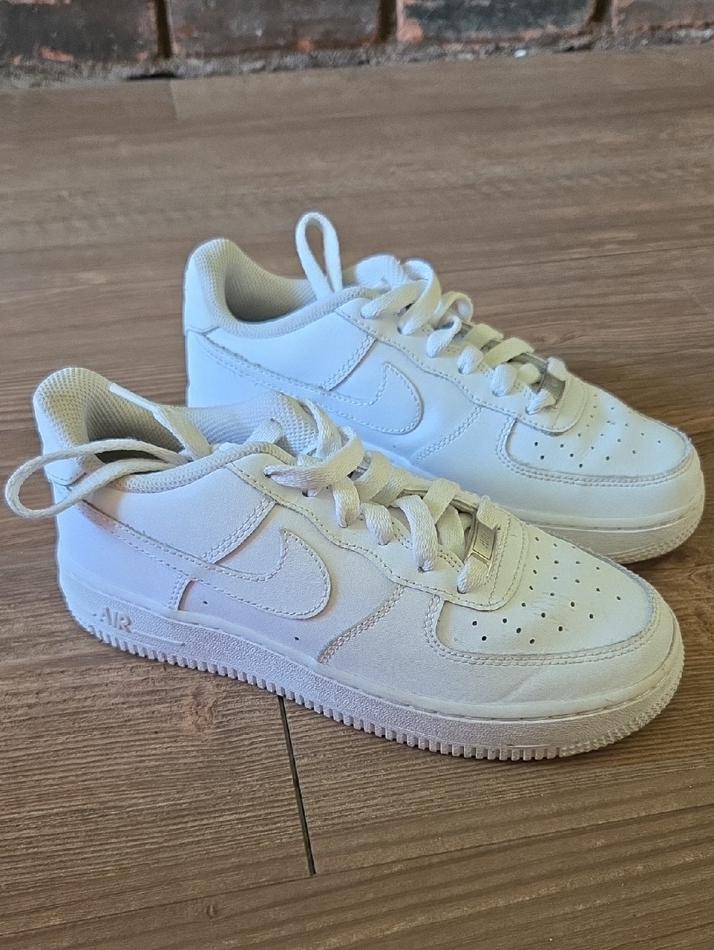 Nike Air Force 1 All-White Leather Sneakers